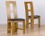 Rossi Oak Oval Extending Dining Table 200-240cm &amp; 4 Girona Oak Dining Chair with Brown, Black or Cream Leather Seat